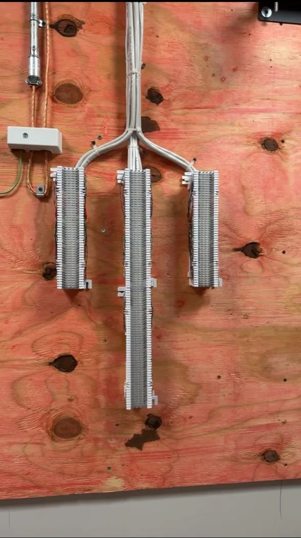 Low-voltage wiring terminated on distribution blocks