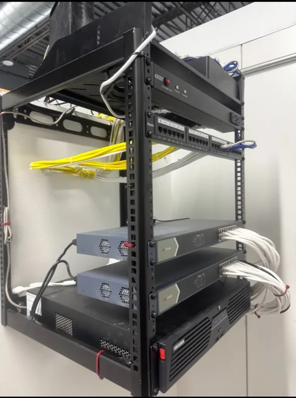 Side view of wired surveillance equipment rack